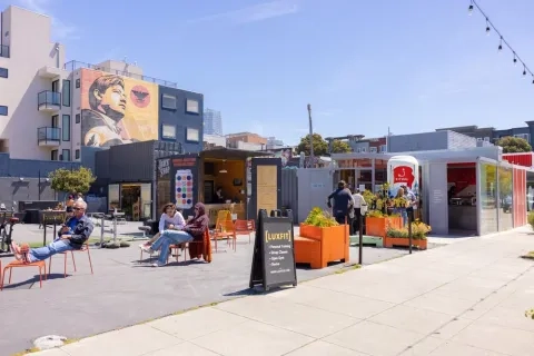 Hayes Valley outdoor gym, coffee shop, and restaurant on a sunny day