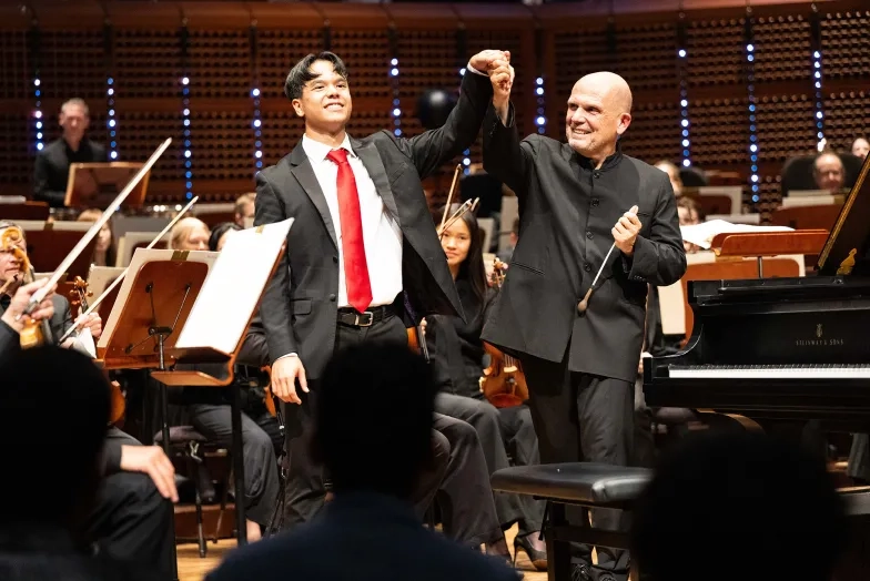 Parker Van Ostrand and conductor Jaap van Zweden.
