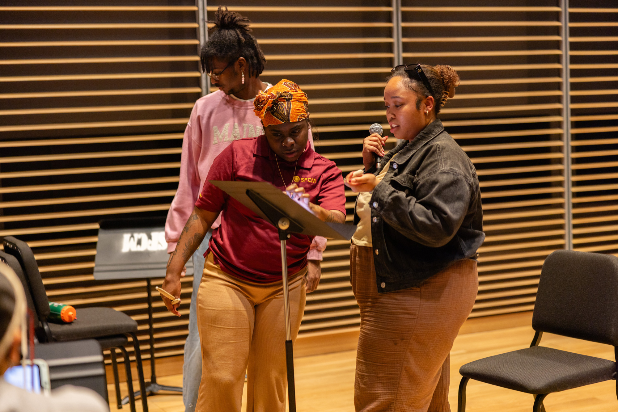 Adrian Jackson (L) and Jay Hernandez (center) at a BSU rehearsal.