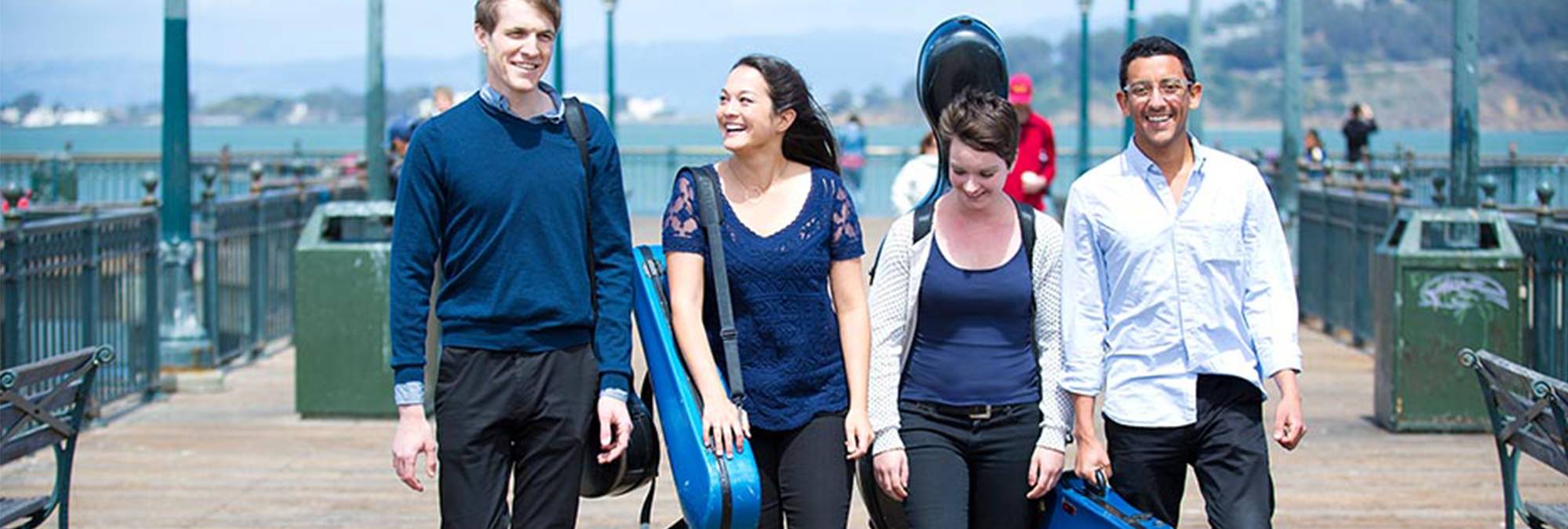 String players walking on the pier
