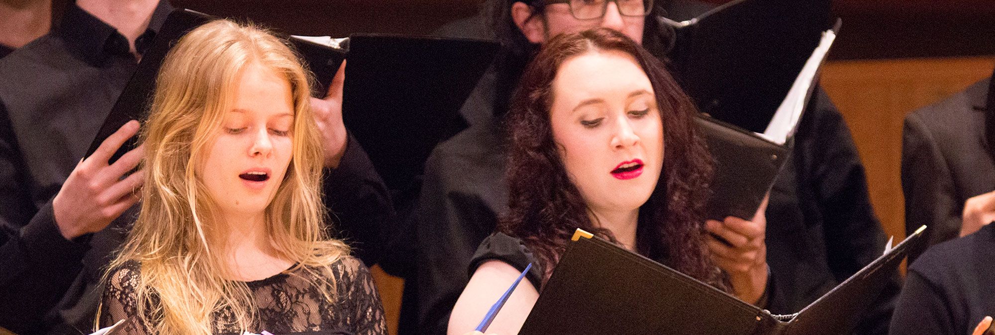 An SFCM student singing in the chorus