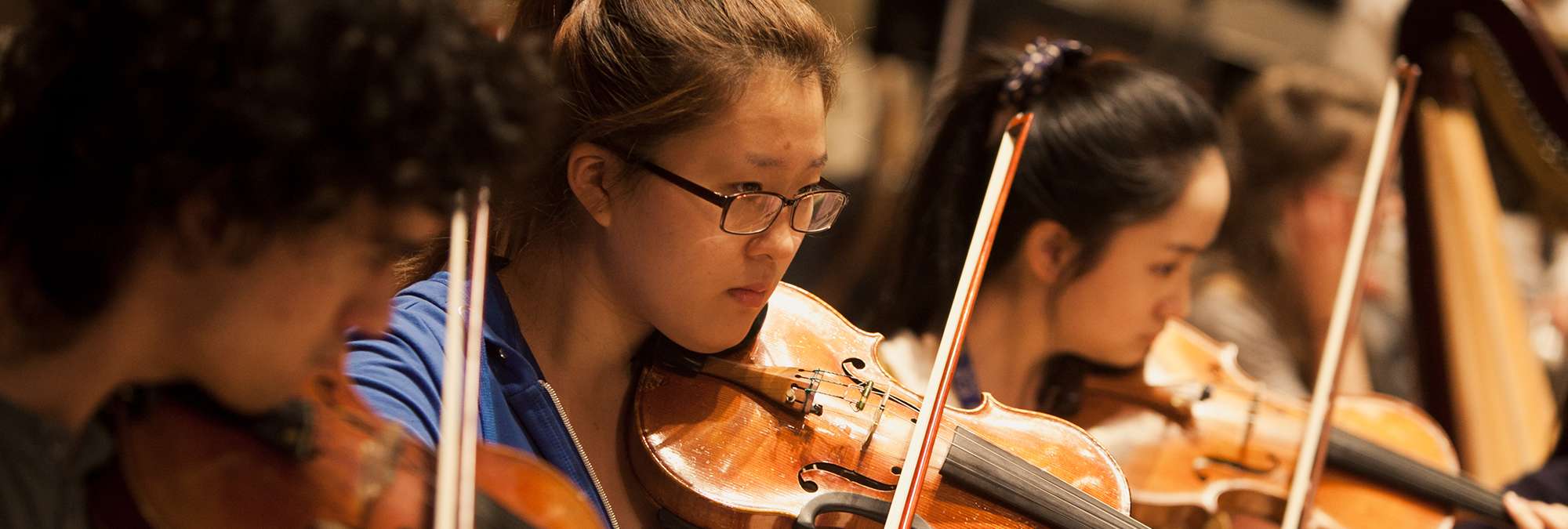 violinist up close playing