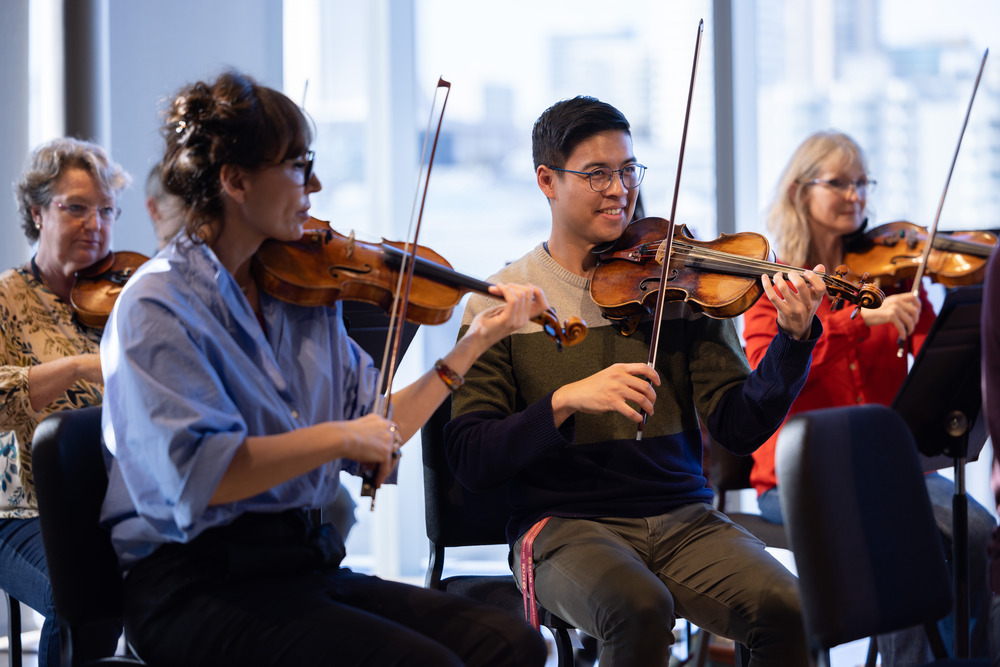 a student plays side by side with the academy at st martin's orchestra