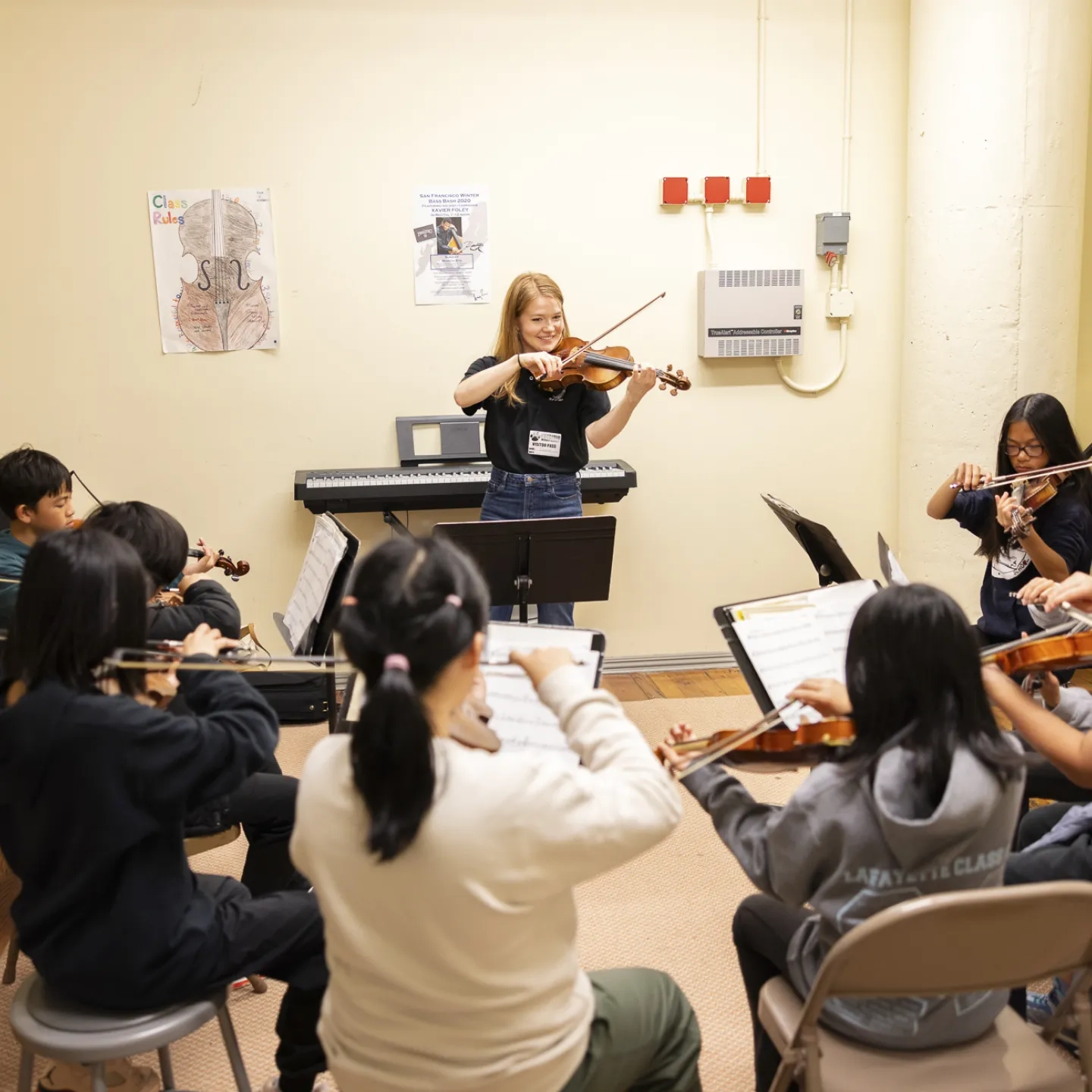 Elizabeth Burch leads a class as part of the Conservatory in Schools program.