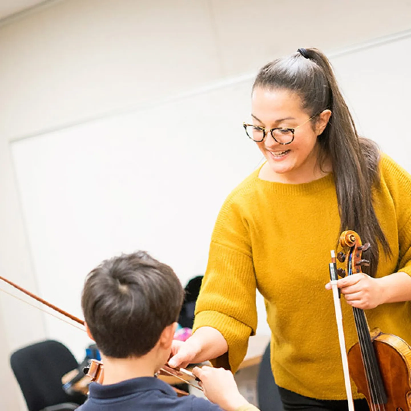 An SFCM student teaching within the community