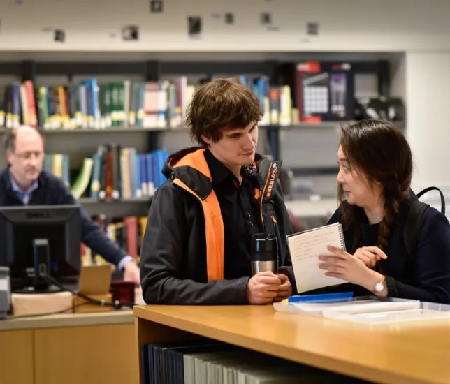 students in library
