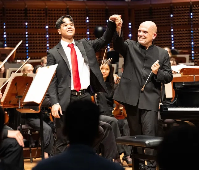 Parker Van Ostrand and conductor Jaap van Zweden.