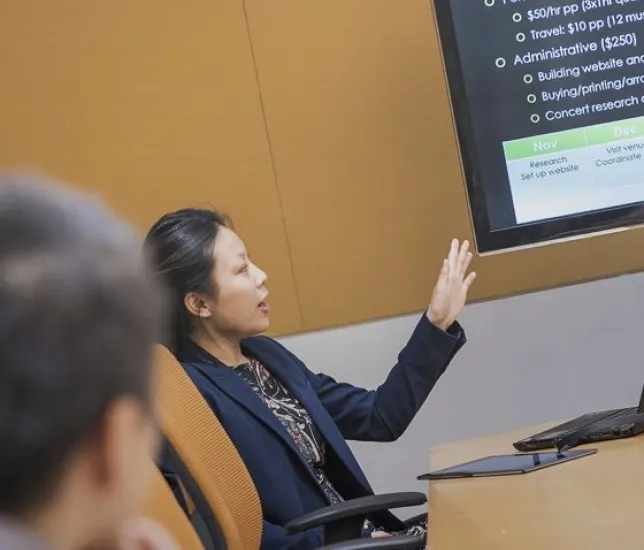 CIL student in class presenting