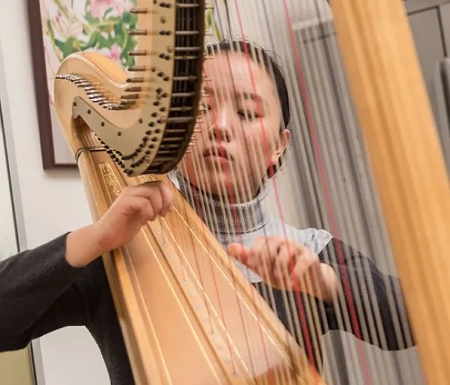 SFCM Pre-College student plays harp