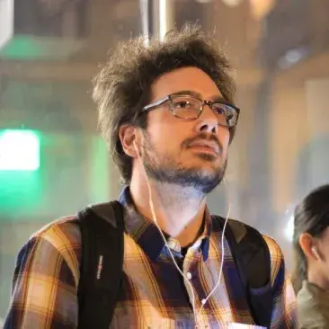 a student listening to music through headphones