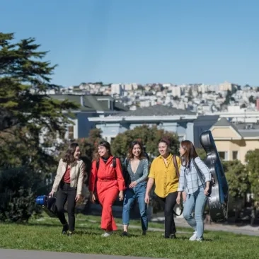 students walk in a park