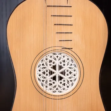 Close-up on Richard Savino's Baroque guitar.