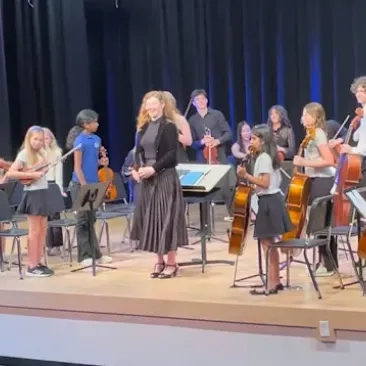 Alexandra Simpsons with music students from the San Domenico School.