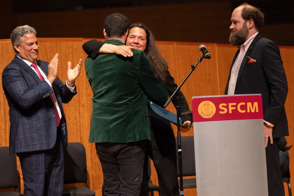 From left: SFCM President David Stull, Evan Kahn, Jennifer Culp, and Dean Jonas Wright.