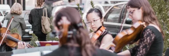 Conservatory students performing on the street