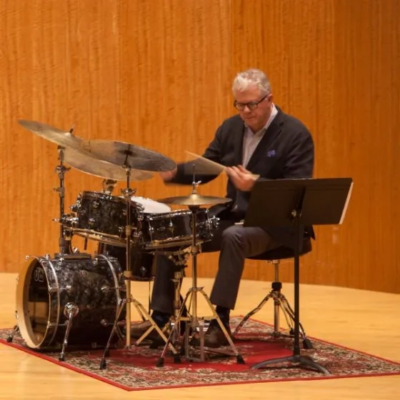 Matt Wilson sitting at drum set