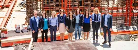 the advancement team in front of sfcm construction