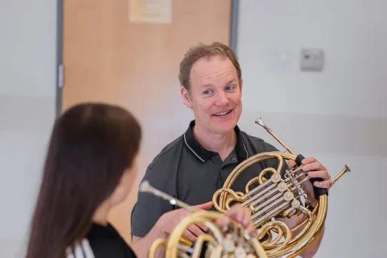 Daniel Wood with a student.