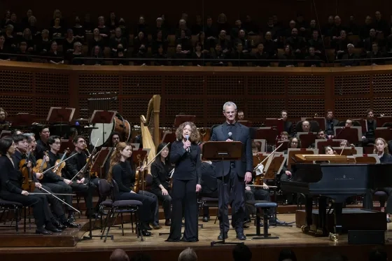 SFS musicians Melissa Kleinbart and Scott Pingel speak at the March 8th benefit concert.