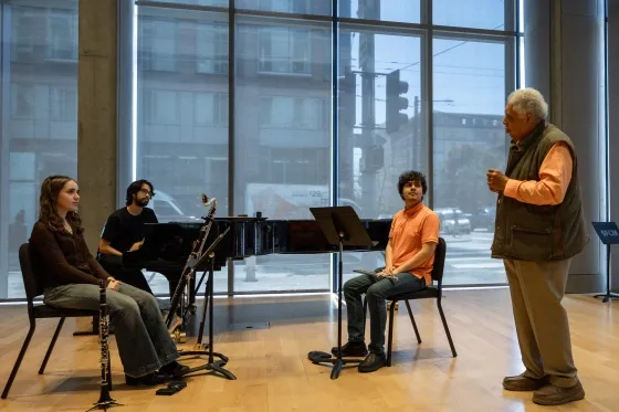 Rufus Reid works with string and piano chamber music students.