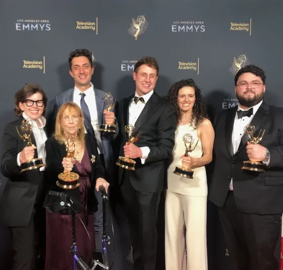 Theo Popov and the creative team behind the project. 