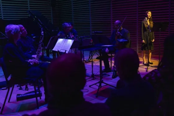 Aaliyah Capili (in spotlight) performs as part of KDFC's Arcade Live! at SFCM.