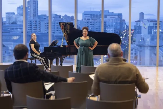 Student Vuyiswa Sigadi performs for Opus 3 Artists reps.