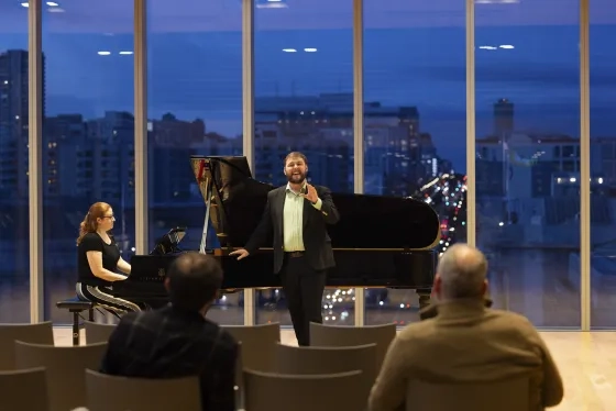 Student Tony Delousia sings in the Barbro Osher Recital Hall at SFCM's Bowes Center.