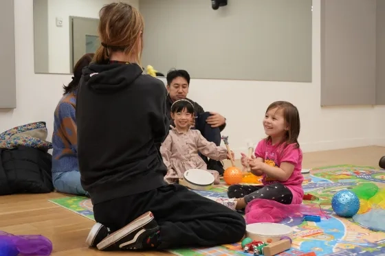 In the age 3 class Aletta and Natalie work with teacher Lauren Urroz.
