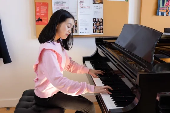 Isabel practices piano at SFCM.