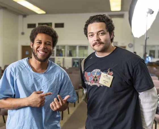 Student Abner Sahaid with a Musicambia student at San Quentin.