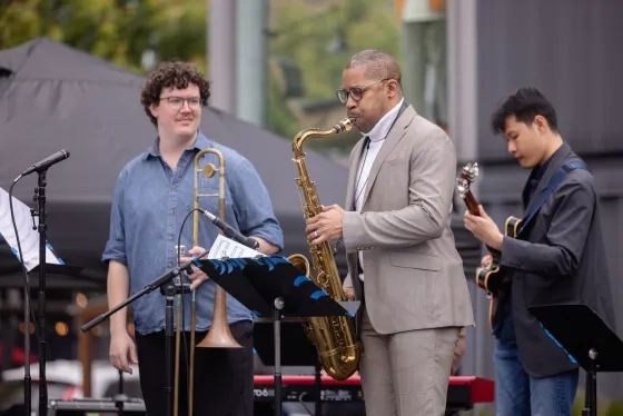 Student Graham Houpt (trombone) plays at the SFJAZZ Festival with Jason Hainsworth (saxophone) and Tri Pham (guitar).
