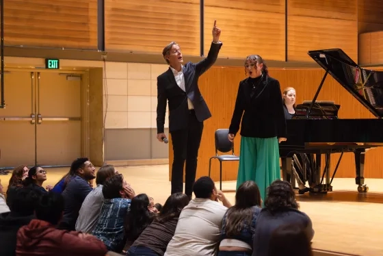 Jake Heggie and student Jordan Riek.