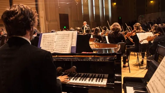 Keyboard performing on stage