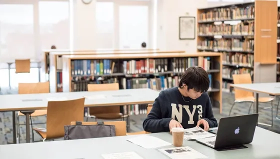 SFCM student studying in library in 50 Oak building