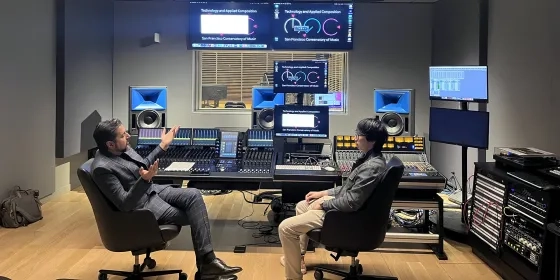 Ricky Kej works with a student in Studio G.