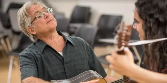 Richard Savino playing guitar