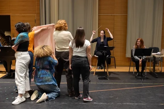 The cast of 'Anon' rehearses with Dana Sadava (conducting) and Heather Mathews (right).