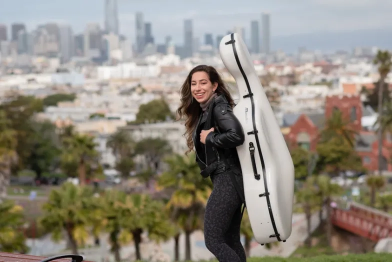 Strings cello outside gigging in city