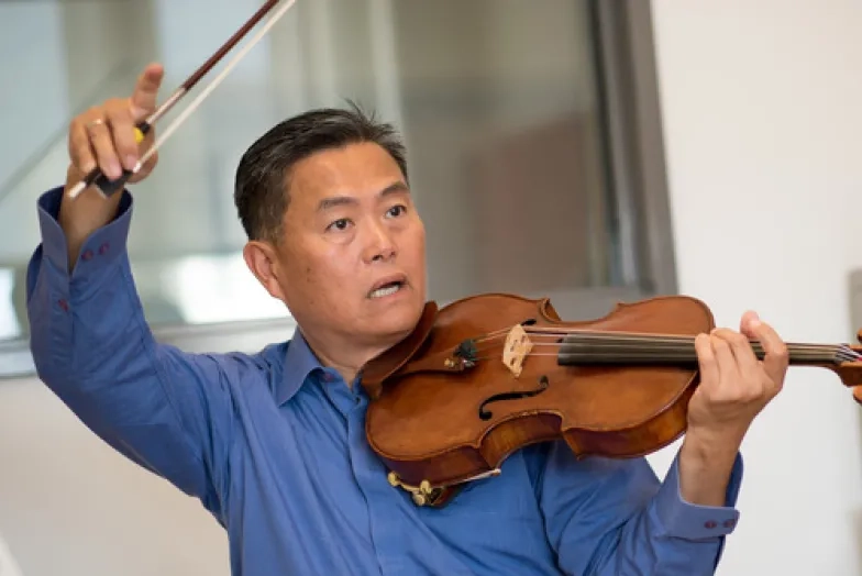 Yun Jie "Jay" Liu playing viola