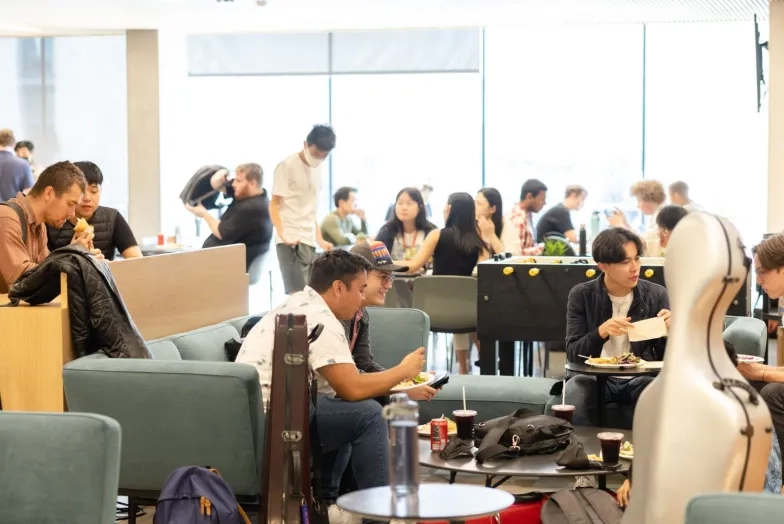 a crowded cafe/lounge area on the first day of classes in the bowes center