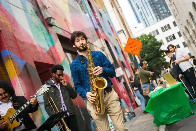 Adam Siemann (tenor sax) playing with other SFCM RJAM students in Hickory Alley.