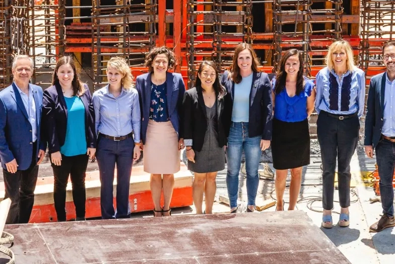 the advancement team in front of sfcm construction