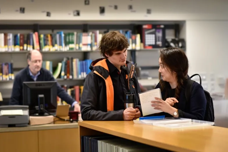 students in library