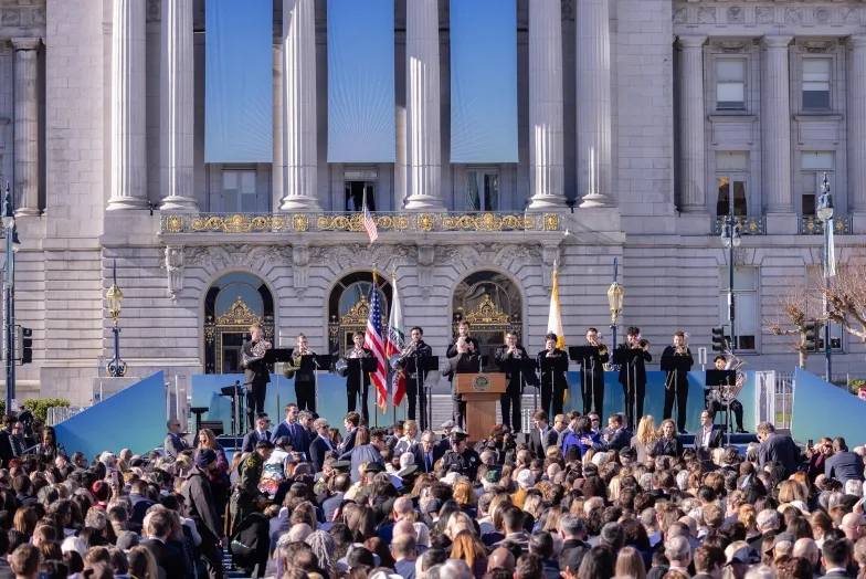 A brass ensemble performs at City Hall.