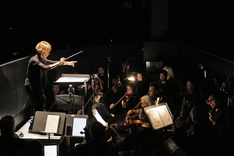 Nicole Paiement conducts the Opera Parallèle orchestra. (Credit: Cory Weaver)