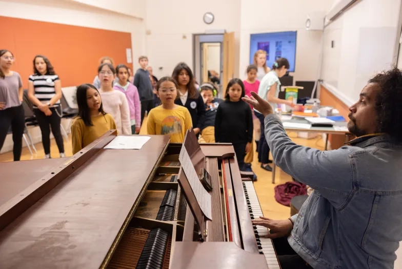 Roco Córdova with students from SFCM's Bridge to Arts and Music program.