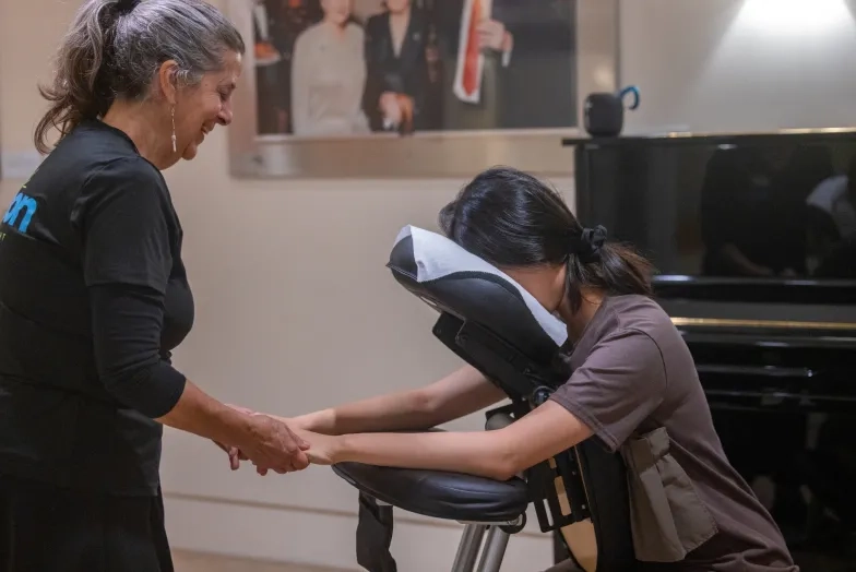A student receives a massage as part of SFCM's Wellness Week.