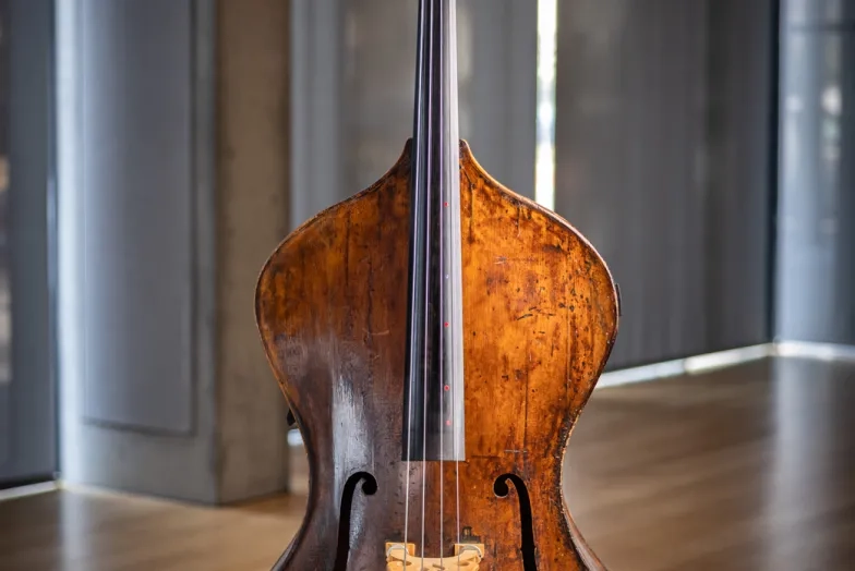 Tramontozzi's bass has guitar-style &quot;shoulders.&quot;