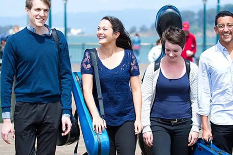 String players walking on the pier